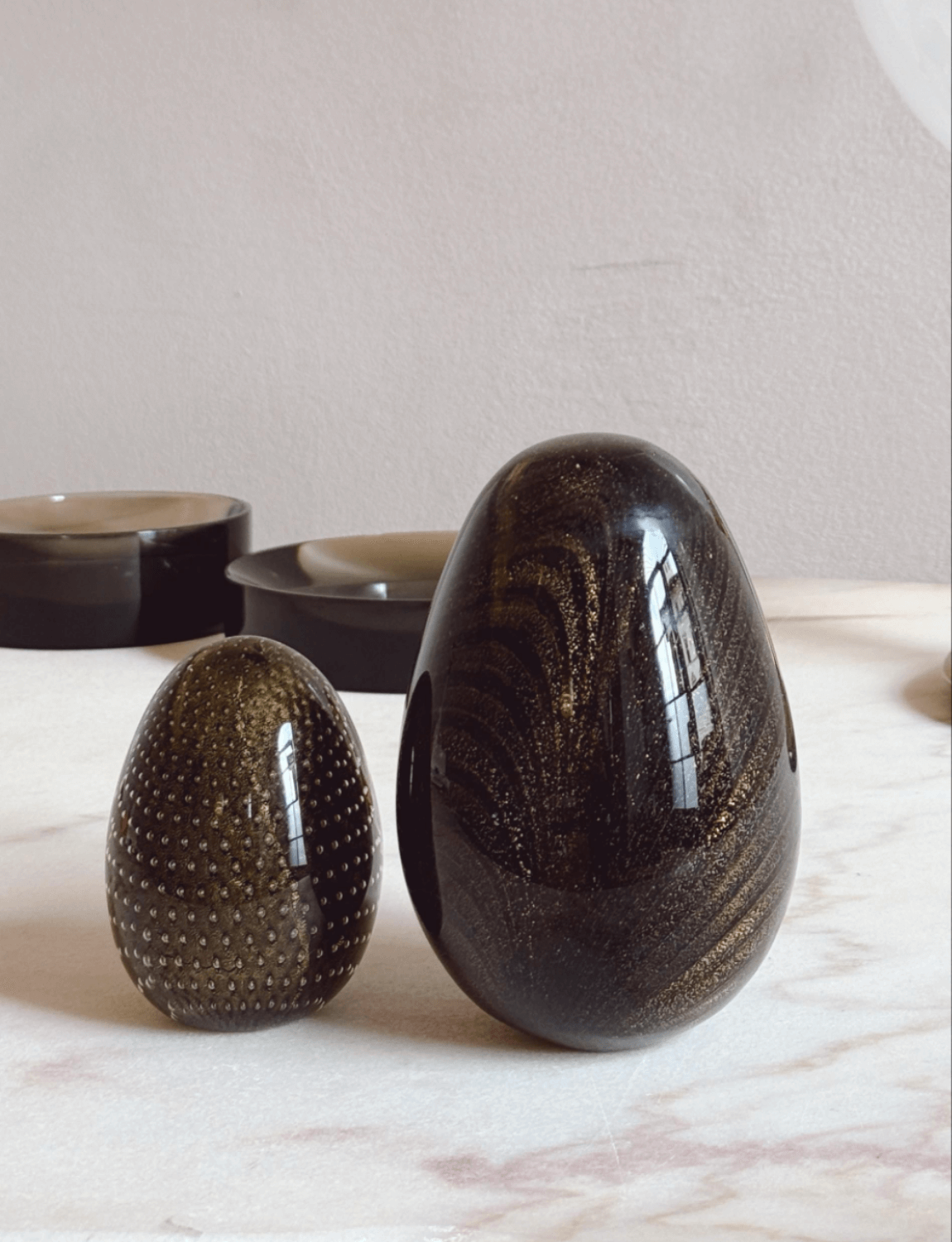 Pair of 1960s Black and gold hand-blown Murano Glass Eggs. By Venini. Signed.